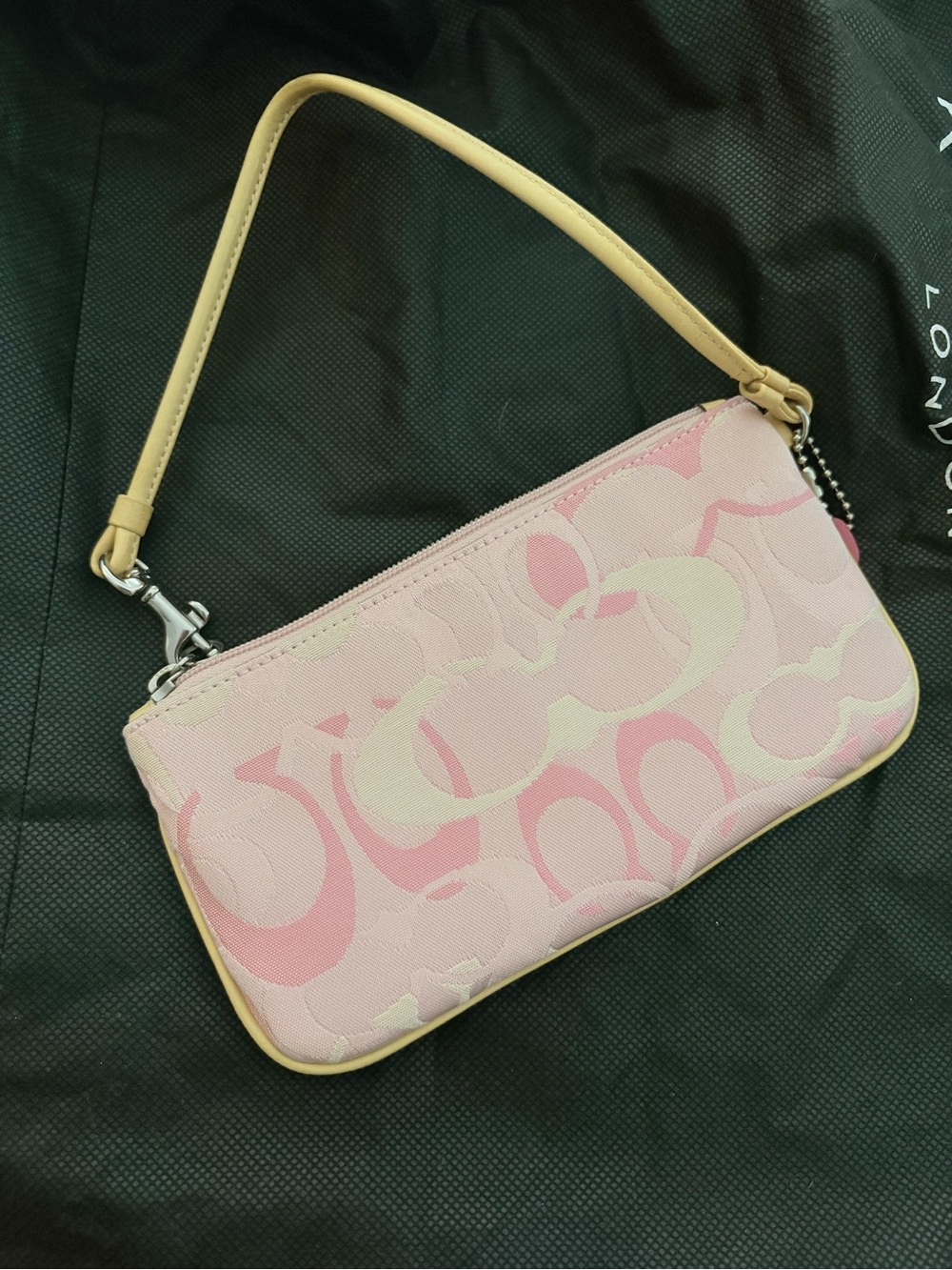 Coach Pink Signature Canvas Wristlet with Tan Strap